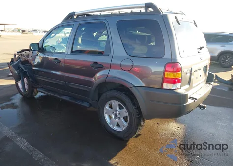 2004 Ford Escape Xlt z USA, uszkodzony, nr VIN 1FMYU93184KB66871